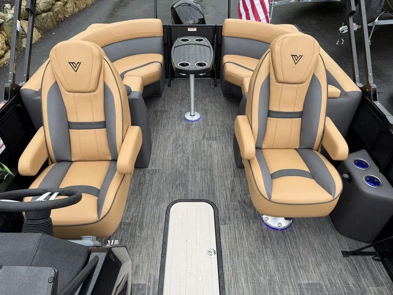 Slide: The Image of Luxurious 2025 Viaggio X20U Tri-Toon boat interior with tan and gray seating. - 14