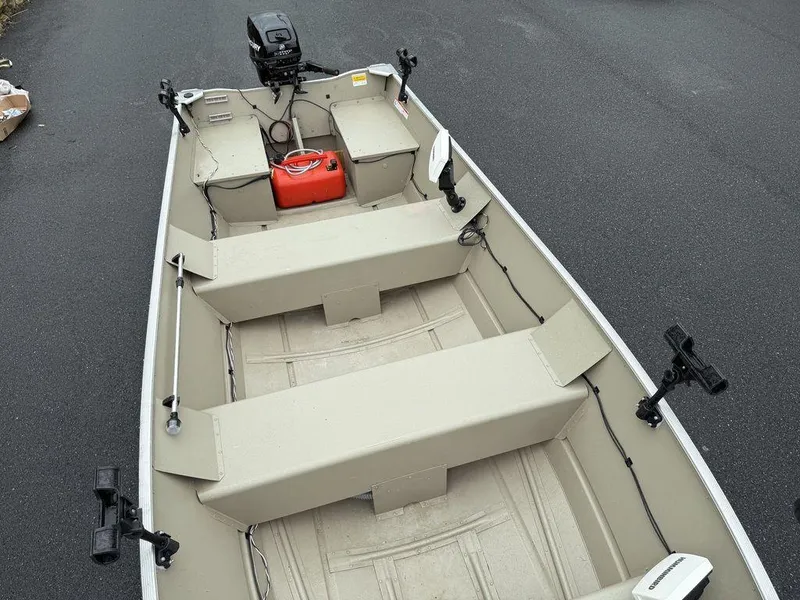 Slide: The Image of 2011 Lowe ANGLER A1667 boat with motor and red fuel tank on deck. - 4