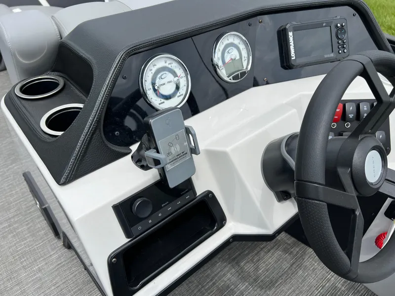Slide: The Image of Dashboard of 2025 Crest Classic 220 SLRC boat with gauges and steering wheel. - 20