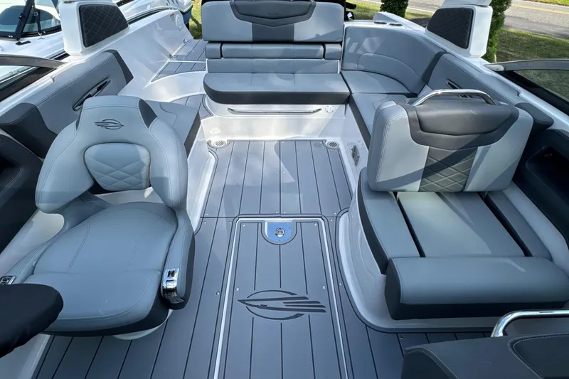 Slide: The Image of 2025 Chaparral 247 SSX boat interior with luxurious gray seating and modern design. - 6