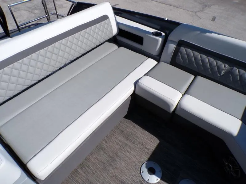 Slide: The Image of Luxurious seating on 2025 Godfrey AquaPatio 255 SFL boat, featuring quilted upholstery. - 12