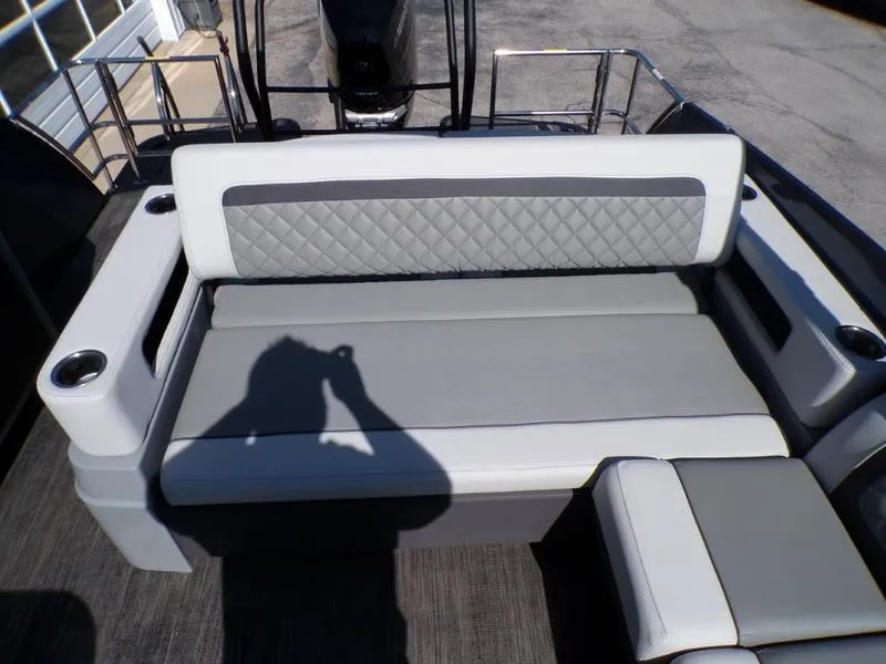 Slide: The Image of 2025 Godfrey AquaPatio 255 SFL boat seating with quilted design and cup holders. - 13