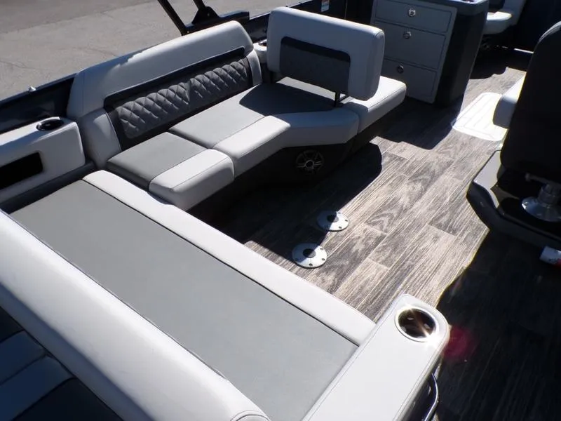 Slide: The Image of Luxurious seating on 2025 Godfrey AquaPatio 255 SFL boat with stylish flooring. - 8