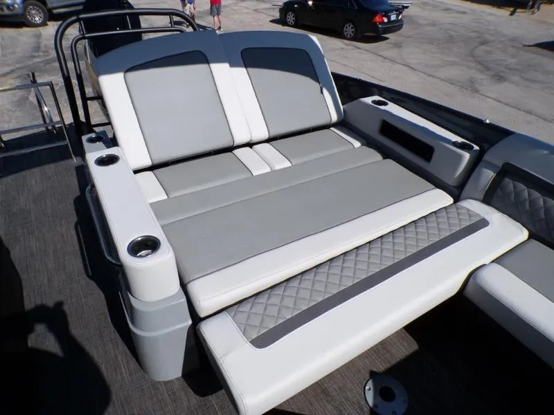 Slide: The Image of 2025 Godfrey AquaPatio 255 SFL boat seating with cup holders and quilted design. - 9