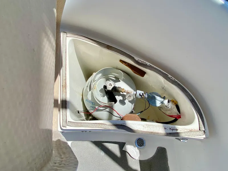 Slide: The Image of Compartment in 1979 Valiant 37 boat, showing internal wiring and components. - 13