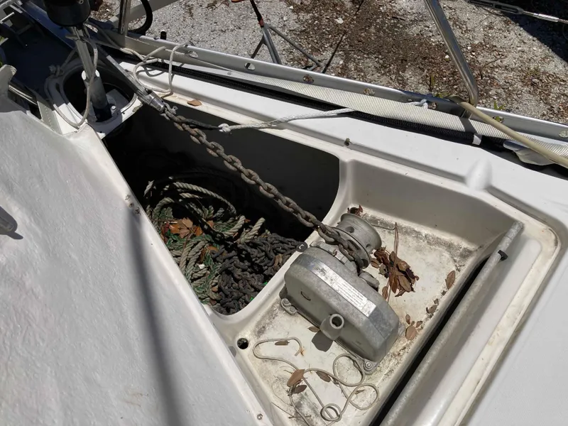 Slide: The Image of Anchor locker of a 1993 Beneteau Oceanis 370 sailboat with chain and ropes. - 24