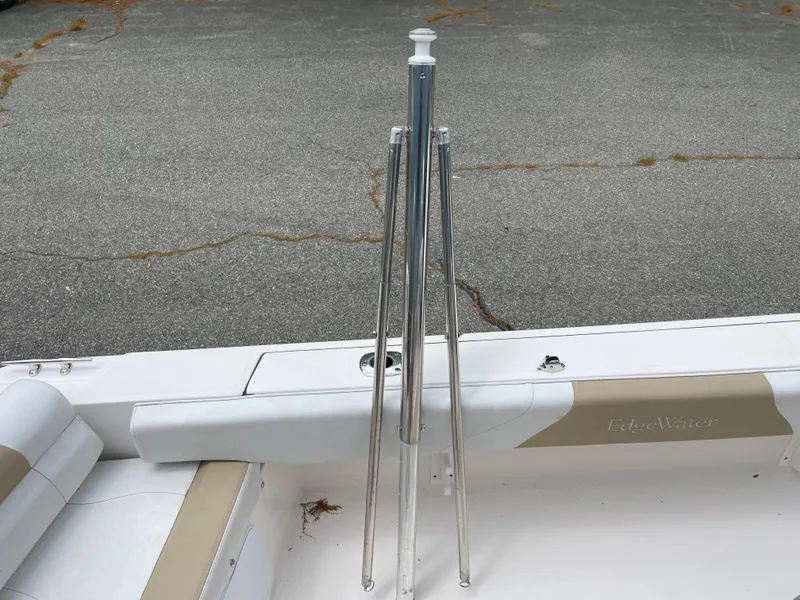 Slide: The Image of 2015 Edgewater 188CC boat with stainless steel rod holders on deck. - 13
