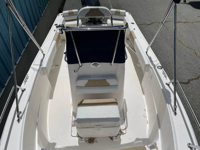 Slide: The Image of 2015 Edgewater 188CC boat interior with seating and console, viewed from above. - 8