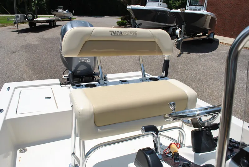 Slide: The Image of 2010 Pathfinder 2400 Tournament Edition boat with Yamaha 250 engine, featuring beige seating. - 18