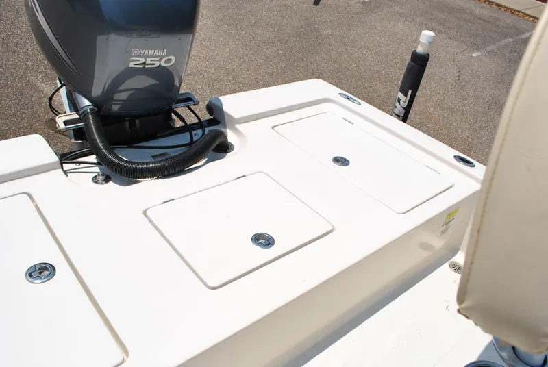 Slide: The Image of 2010 Pathfinder 2400 Tournament Edition boat with Yamaha 250 engine, featuring storage compartments. - 28
