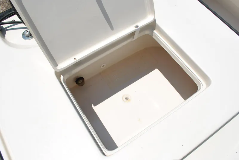 Slide: The Image of Open storage compartment on 2010 Pathfinder 2400 Tournament Edition boat. - 31