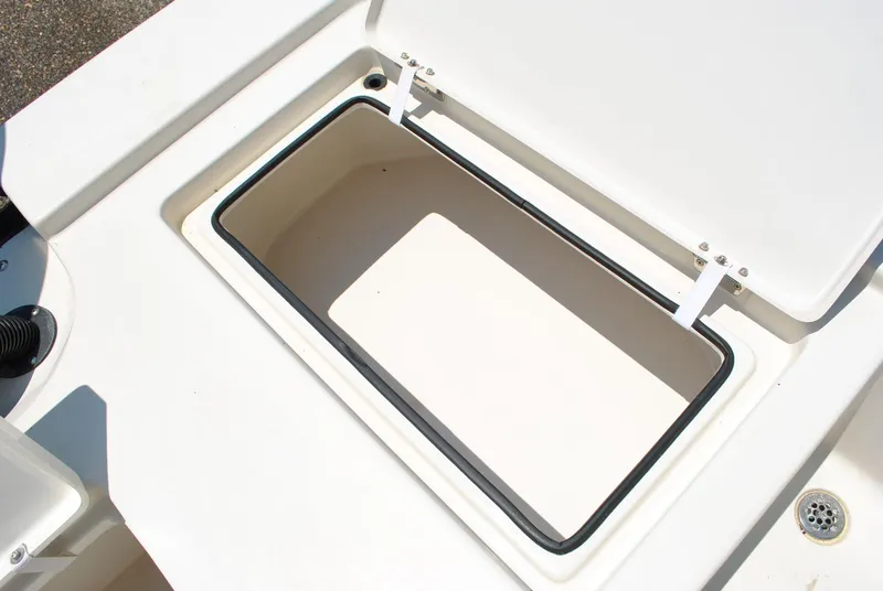 Slide: The Image of Open storage compartment on 2010 Pathfinder 2400 Tournament Edition boat. - 32