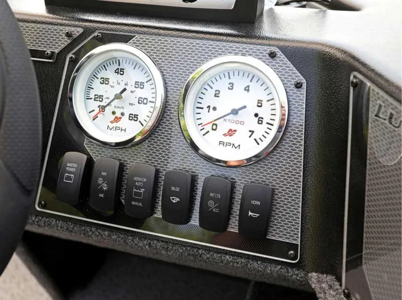 Slide: The Image of Dashboard of 2026 Lund 1650 Angler boat with speedometer and RPM gauges. - 6