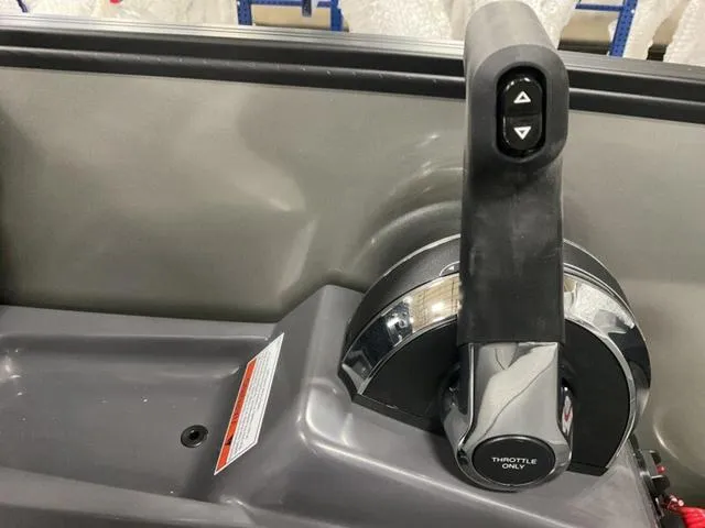 Slide: The Image of Throttle control lever on a 2025 Bennington M Quad Bench 22 MFB boat. - 17