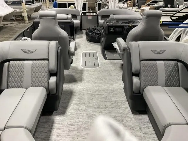 Slide: The Image of 2025 Bennington M Quad Bench 22 MFB interior with luxurious gray seating and modern design. - 9
