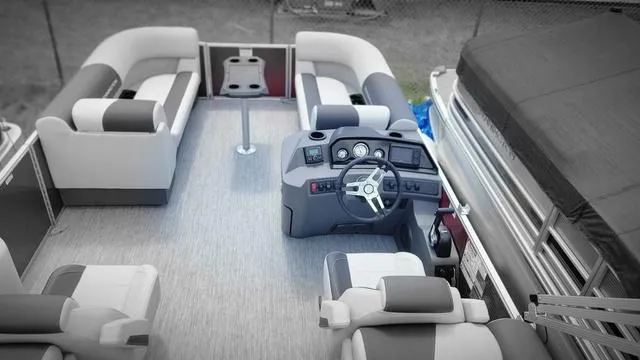Slide: The Image of 2025 Bennington S Quad Bench 22 SSR pontoon boat interior with seating and helm. - 4
