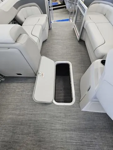 Slide: The Image of Interior of 2025 Godfrey Sweetwater 2286 SFL pontoon with open storage compartment. - 10