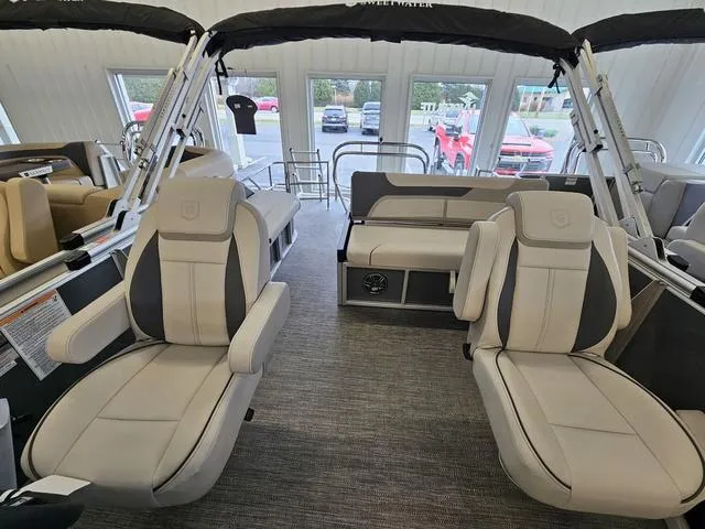 Slide: The Image of 2025 Godfrey Sweetwater 2286 SFL pontoon interior with plush seating and modern design. - 3