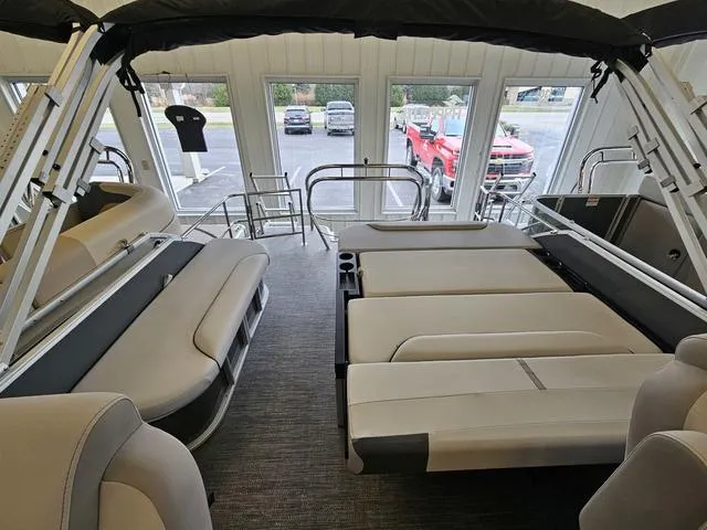 Slide: The Image of 2025 Godfrey Sweetwater 2286 SFL GTP pontoon interior with plush seating and modern design. - 8