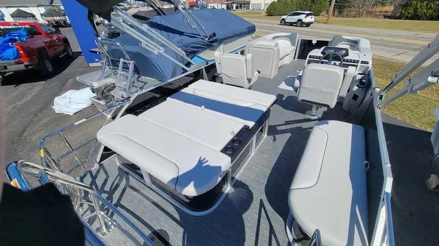 Slide: The Image of 2025 Godfrey Sweetwater 2286 SFL pontoon boat with spacious seating and modern design. - 8