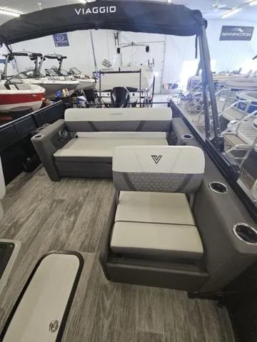 Slide: The Image of 2025 Viaggio LAGO Z 22S 3T boat interior with modern seating and sleek design. - 8