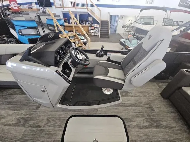 Slide: The Image of Interior of 2025 Viaggio LAGO Z 22S 3T boat with modern helm and seating. - 9