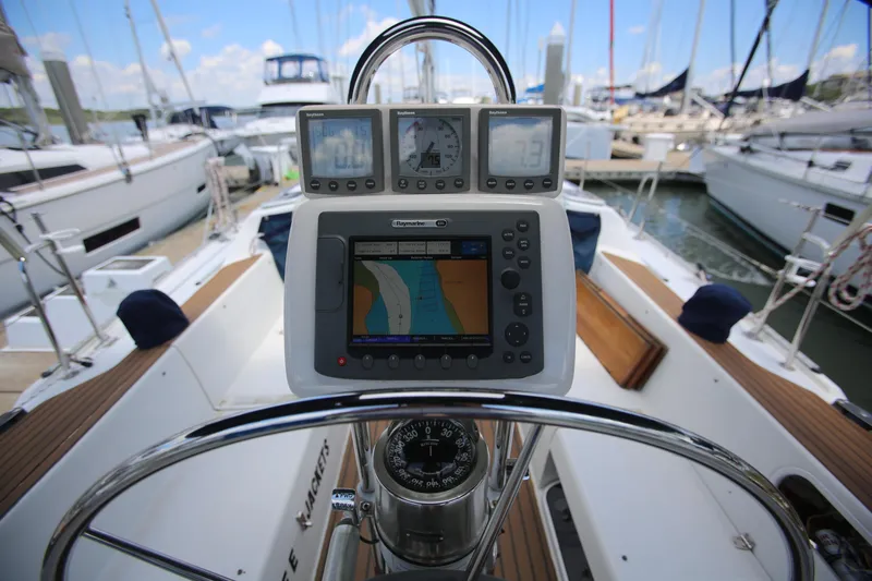 Slide: The Image of Cockpit view of 2002 Catalina 36 sailboat with navigation instruments and compass. - 3