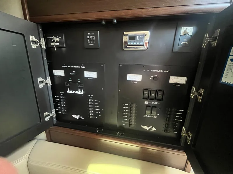 Slide: The Image of Electrical control panel inside 2010 Chaparral 400 Premiere boat. - 25