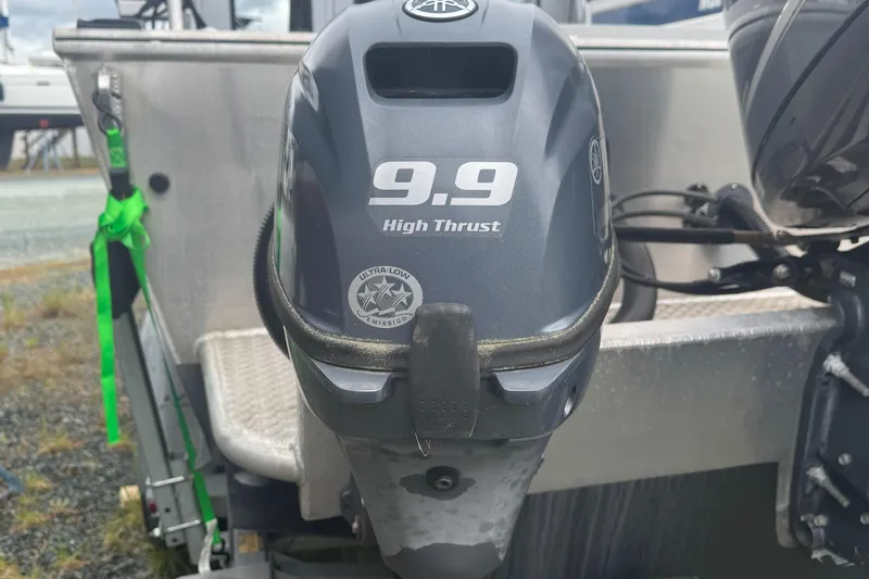 Slide: The Image of Outboard motor on 2017 Hewescraft 240 Ocean Pro HT, featuring 9.9 High Thrust engine. - 18