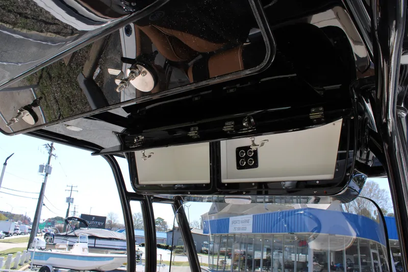 Slide: The Image of 2025 Key West 263 FS boat interior with rod holders and cup holder. - 18