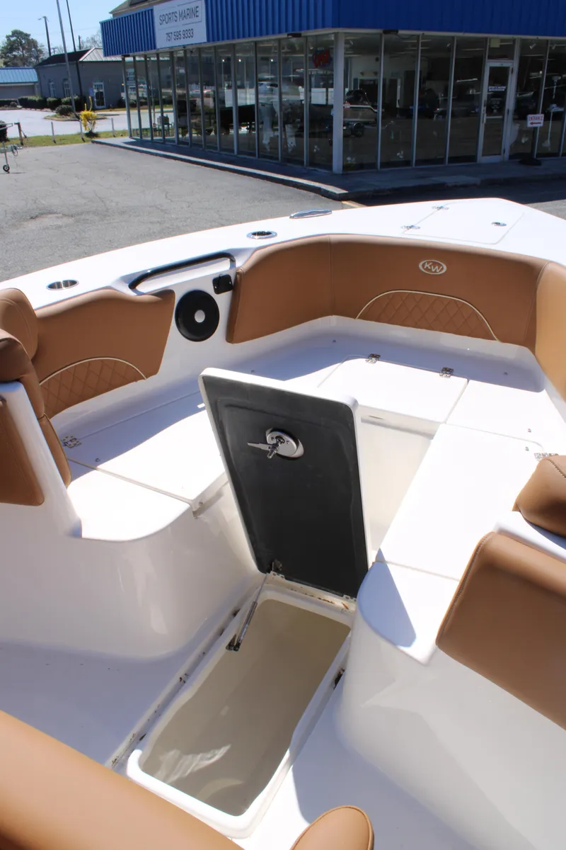 Slide: The Image of Luxurious seating on 2025 Key West 263 FS boat, featuring tan leather upholstery. - 21