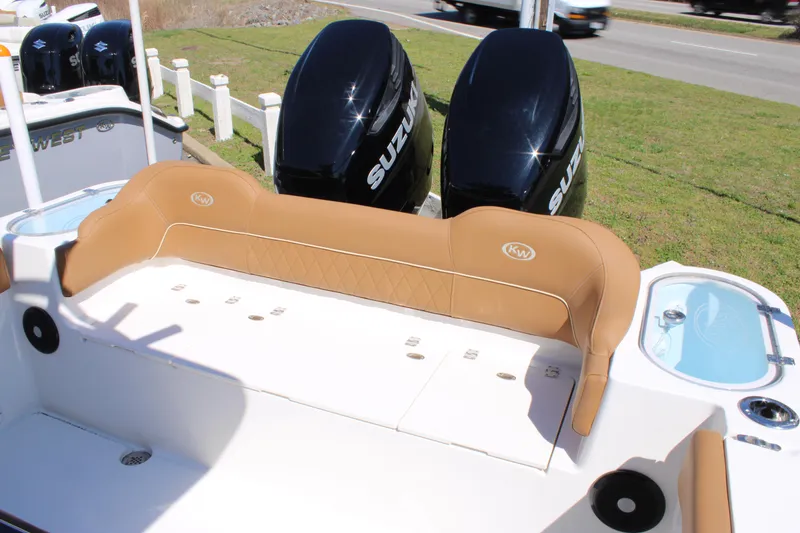 Slide: The Image of 2025 Key West 263 FS boat with dual Suzuki engines, featuring spacious seating and storage. - 27