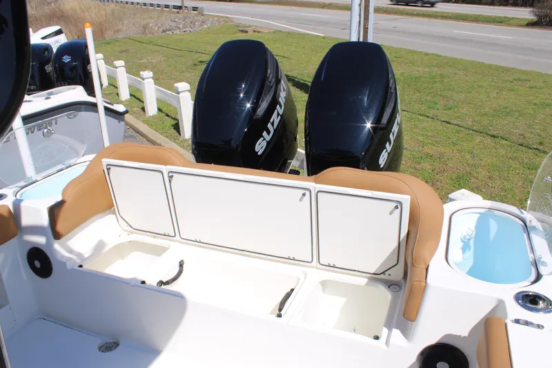 Slide: The Image of Livewell on 2025 Key West 263 FS boat, featuring a blue interior. - 28