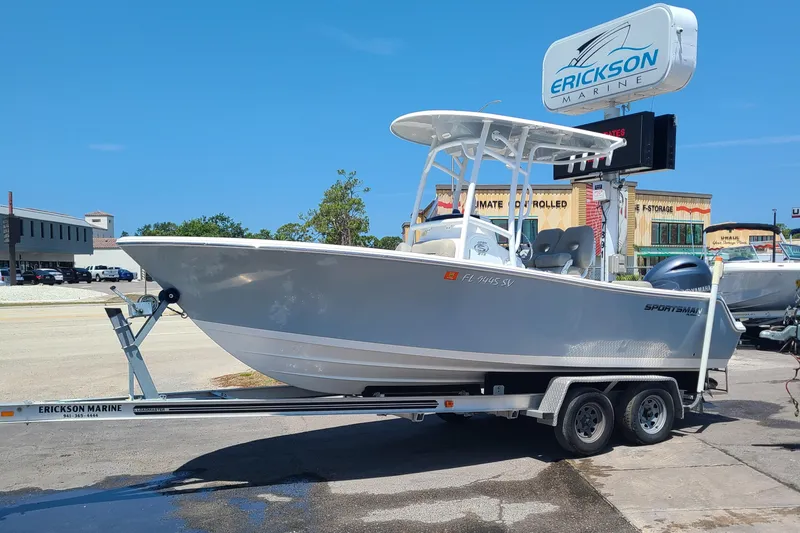 Slide: The Image of 2021 Sportsman Open 212 Center Console boat on trailer at Erickson Marine dealership. - 0