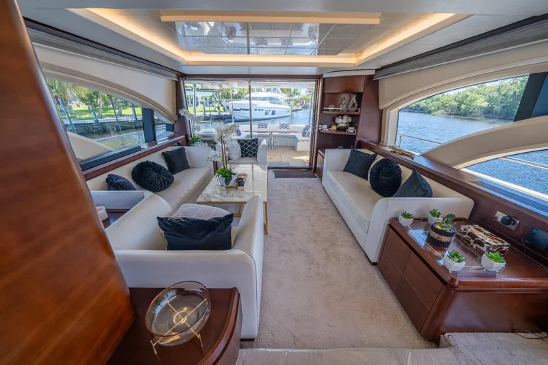 Slide: The Image of Luxurious interior of 2010 Azimut 75 Fly yacht with elegant seating and scenic water views. - 23