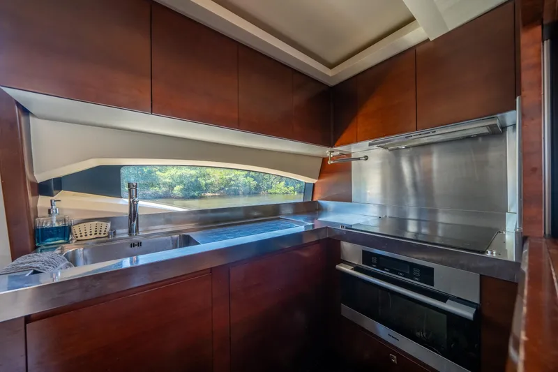 Slide: The Image of Luxurious kitchen interior of 2010 Azimut 75 Fly yacht with modern appliances. - 29