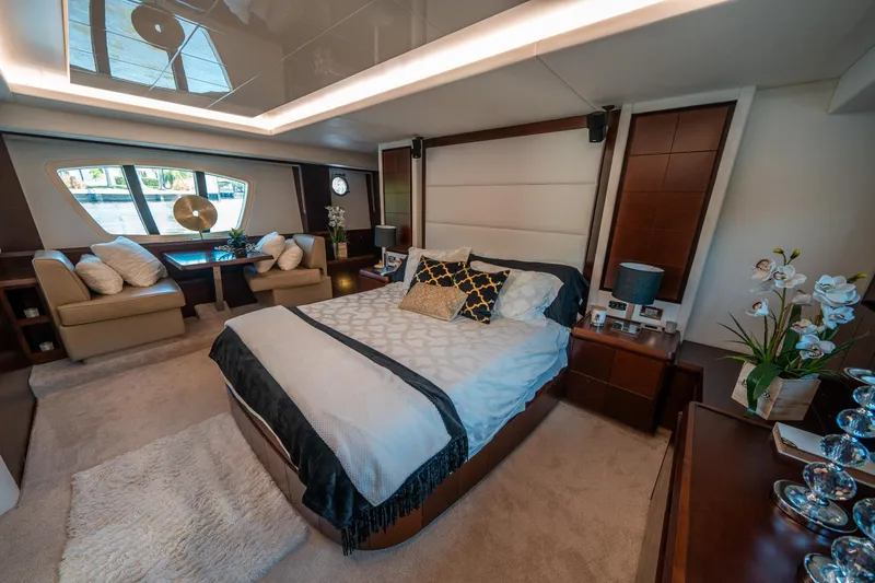 Slide: The Image of Luxurious bedroom interior of 2010 Azimut 75 Fly yacht with elegant decor and large windows. - 36