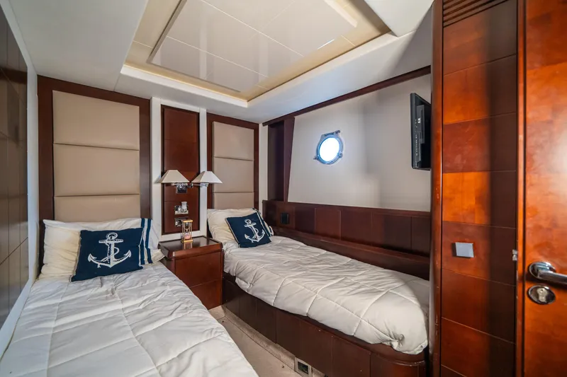 Slide: The Image of Luxurious cabin interior of 2010 Azimut 75 Fly yacht with twin beds and nautical decor. - 41