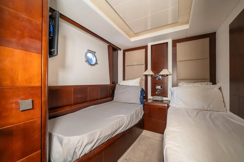 Slide: The Image of Luxurious cabin interior of 2010 Azimut 75 Fly yacht with twin beds. - 42