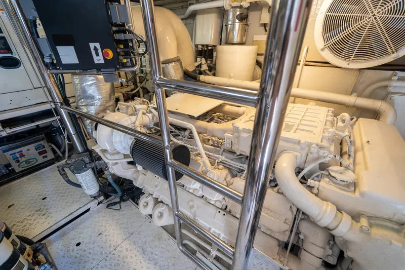 Slide: The Image of Engine room of 2010 Azimut 75 Fly yacht, featuring complex machinery and equipment. - 48