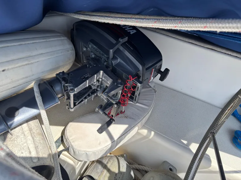 Slide: The Image of Outboard motor stored on a 1995 Pacific Seacraft Crealock 37 sailboat. - 13