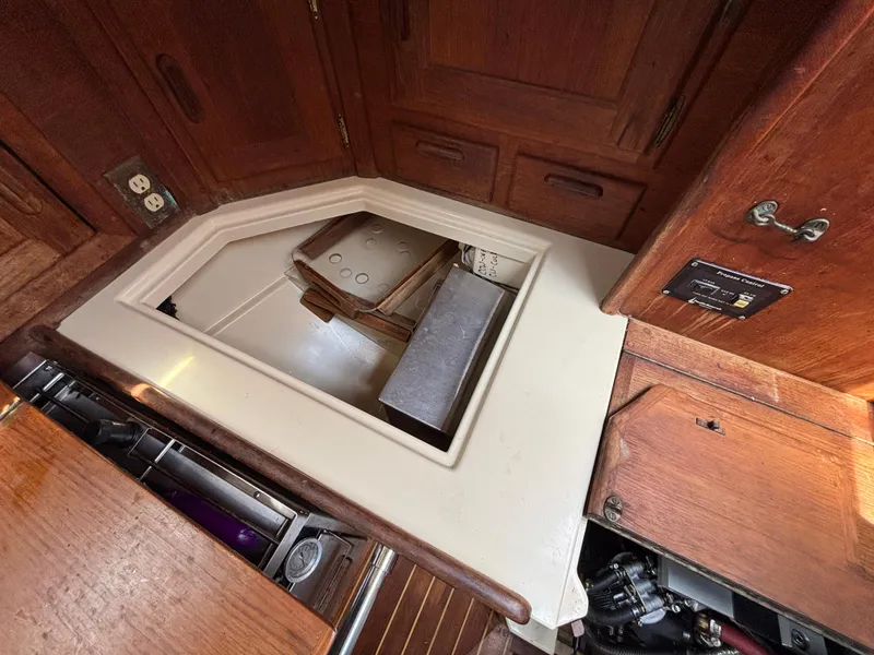 Slide: The Image of Interior view of 1995 Pacific Seacraft Crealock 37 sailboat, showcasing storage compartment. - 34
