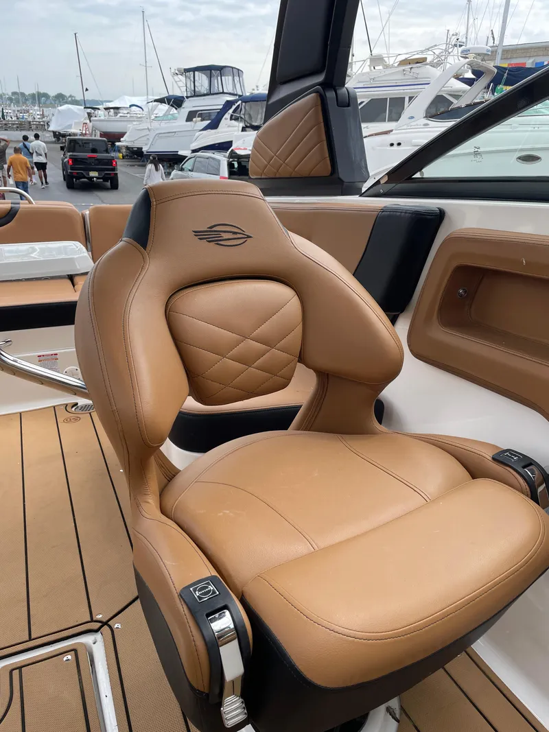 Slide: The Image of 2023 Chaparral 287 SSX boat speaker with tan leather trim. - 12