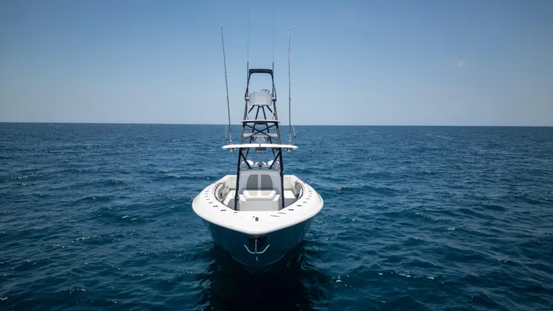 Slide: The Image of 2023 Contender 44 CB boat on open ocean, front view. - 5