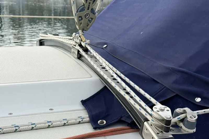 Slide: The Image of Close-up of 1979 Ericson 30 Plus sailboat rigging and ropes on deck. - 30
