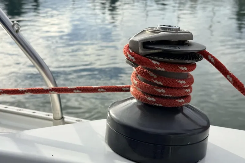 Slide: The Image of Close-up of a winch with red rope on a 1979 Ericson 30 Plus sailboat. - 32