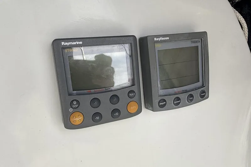 Slide: The Image of Raymarine and Raytheon marine instruments on 1979 Ericson 30 Plus sailboat. - 36