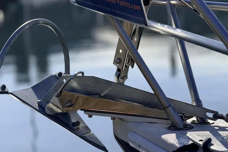 Slide: The Image of Close-up of a 1979 Ericson 30 Plus sailboat anchor and bow detail. - 46