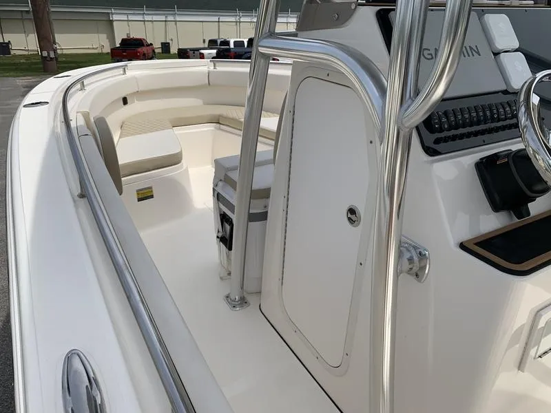 Slide: The Image of 2024 Bulls Bay 255CC boat interior with seating and control panel. - 22