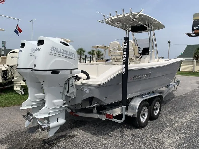 Slide: The Image of 2024 Bulls Bay 255CC boat with dual Suzuki engines on a trailer. - 4